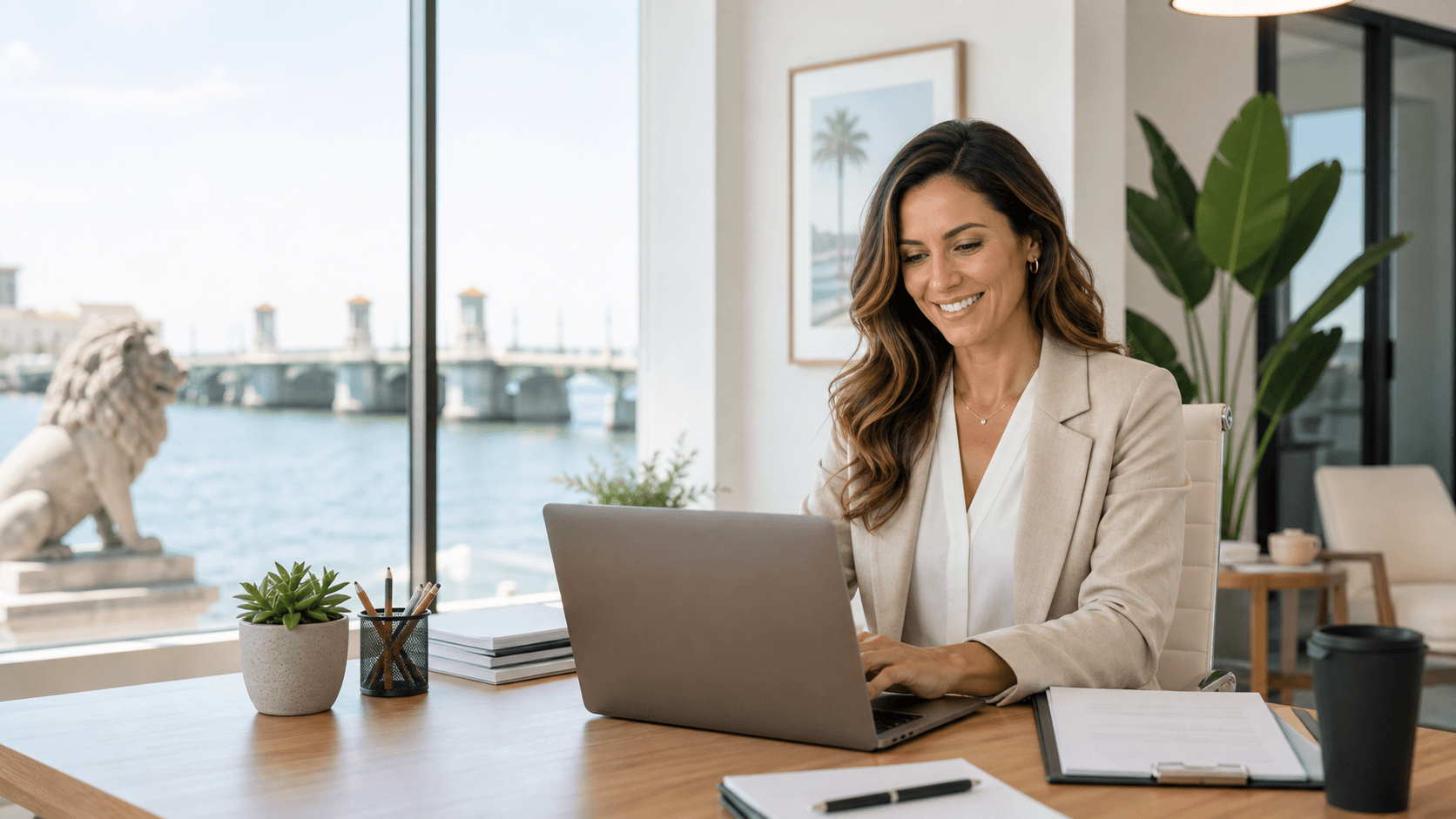 Local business owner reviewing AI search visibility and answer engine content on a laptop.